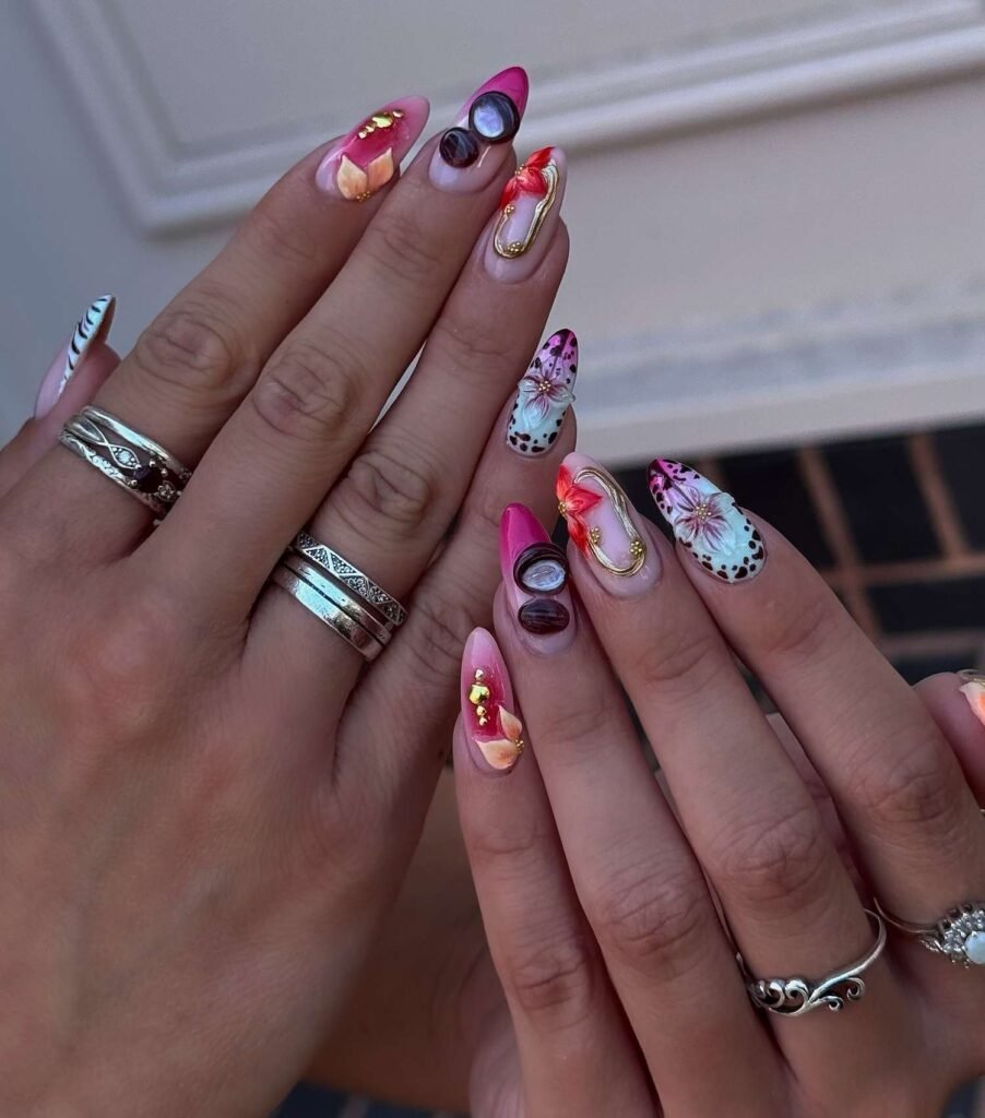 Almond nails with 3D floral, pearl, and gold foil mixed nail art