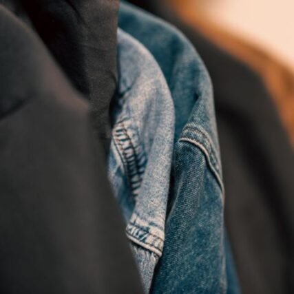 Close-up of denim fabric showing seams and stitching texture