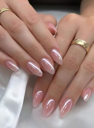 Soft pearl chrome nail polish finish on manicured hand