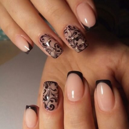 Nail art design created using reverse stamping technique