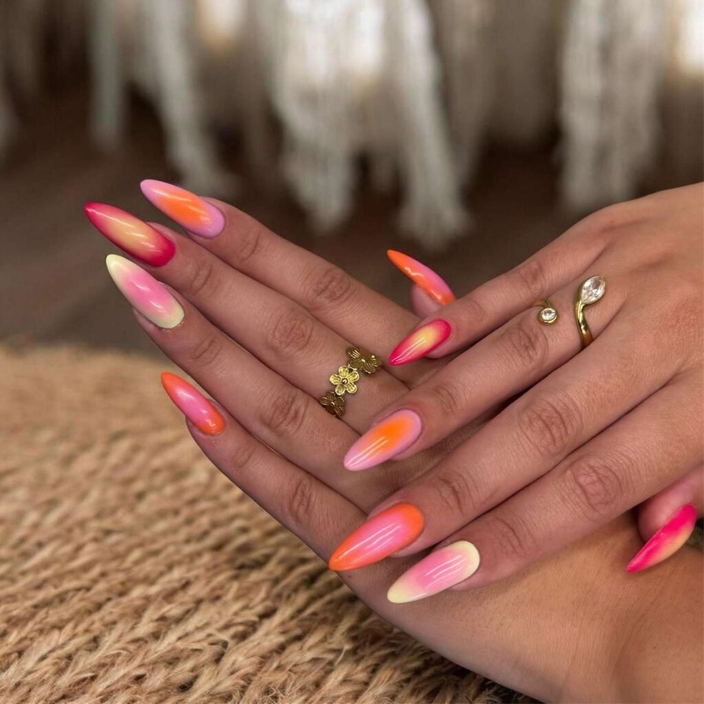 Pink, orange, and yellow sunset ombre almond nails