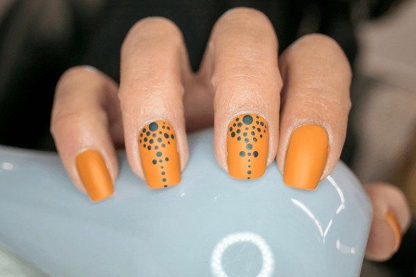 Autumn mismatched nail art with stripes and polka dots
