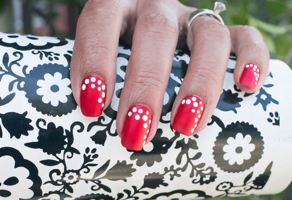 Cherry wine French manicure with polka dot accents