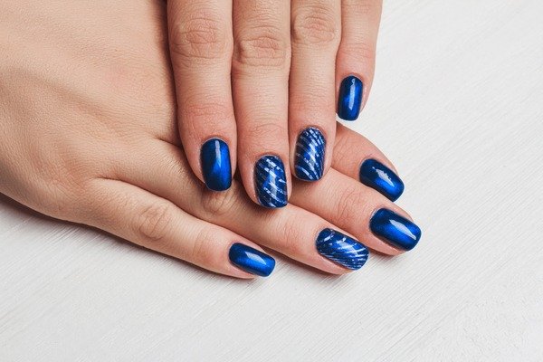 Electric blue glitter cobalt nail polish