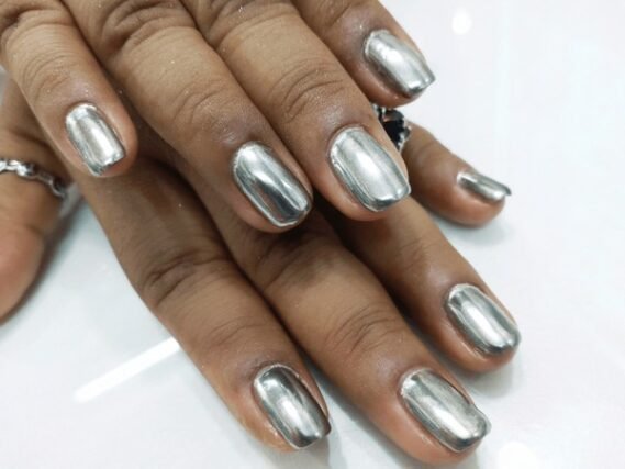 Chrome metallic details over jelly base nail art
