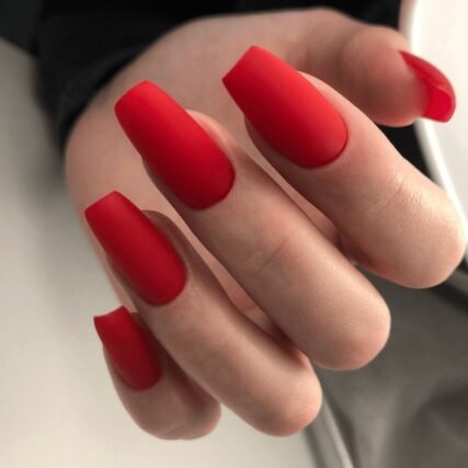matte red nail polish manicure hand