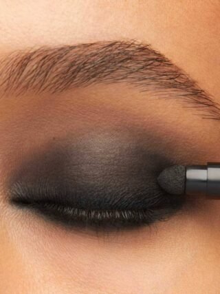 Dark eyeshadow applied too early creating a muddy crease