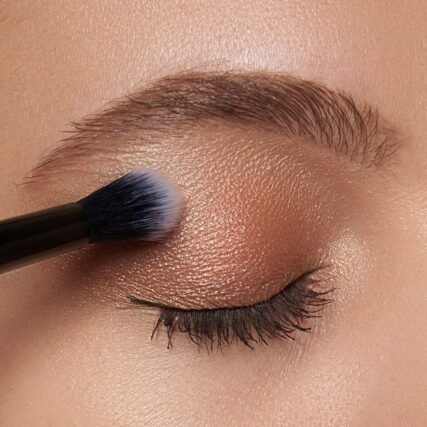 Neutral brown eyeshadow blended with a fluffy brush