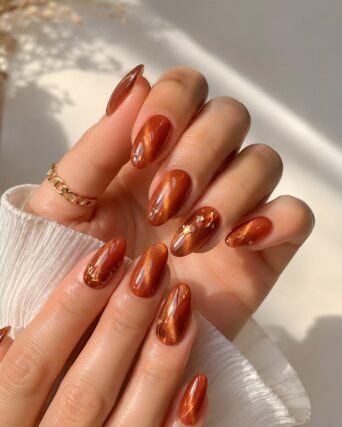 Orange amber velvet effect cat eye gel nails