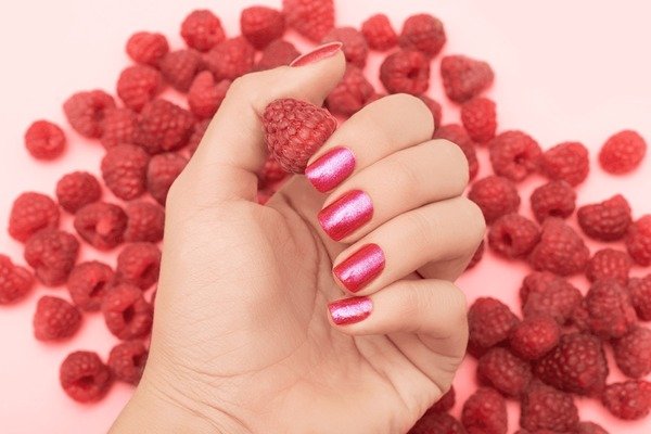 Raspberry toned glitter nail polish manicure