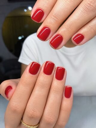 short square red nails manicure hand