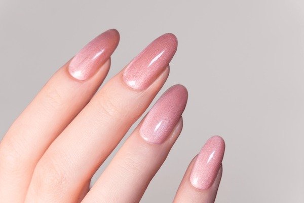 Speckled almond shaped jelly nail design