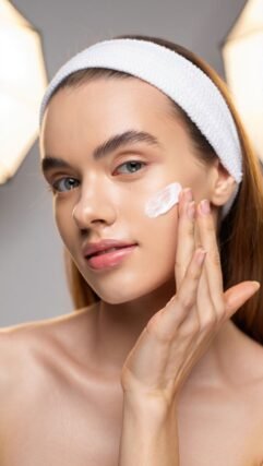 Applying SPF sunscreen during fall skincare routine